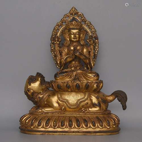 A GILT-BRONZE FIGURE OF MAHAKALA