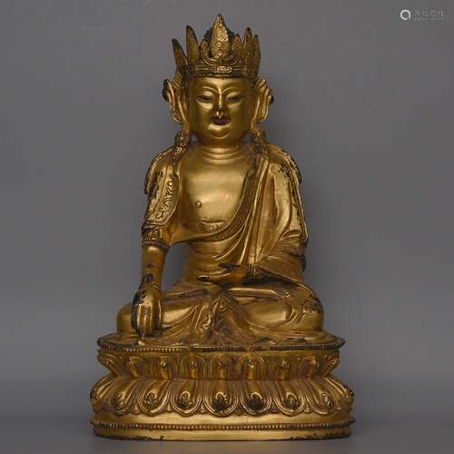 A GILT-BRONZE FIGURE OF BUDDHA