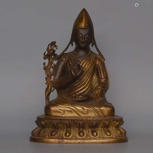 A GILT-BRONZE FIGURE OF TSONGKHAPA