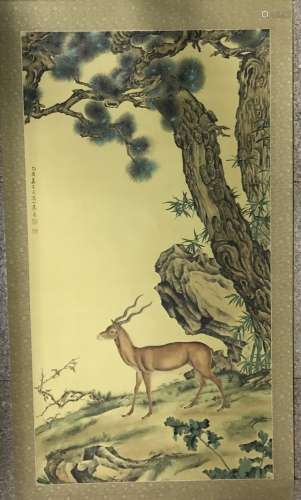 A CHINESE PAINTING OF A DEER AND PINE TREE