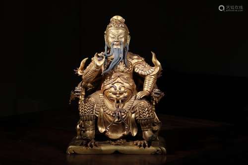 A GILT-BRONZE FIGURE OF GUANGONG