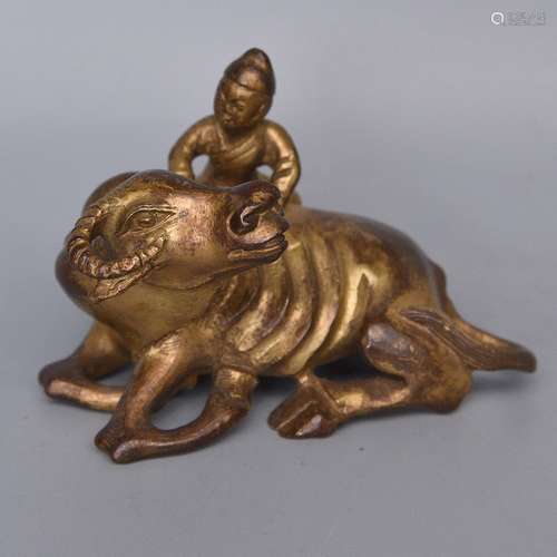 A GILT-BRONZE PAPER WEIGHT