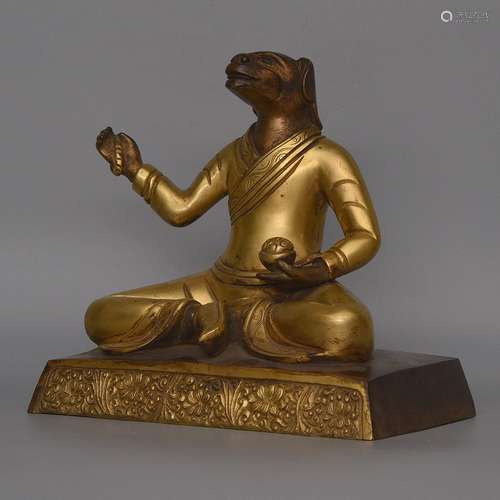 A GILT-BRONZE FIGURE OF BUDDHA