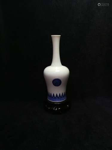 A BLUE AND WHITE BOTTLE VASE, KANGXI MARK