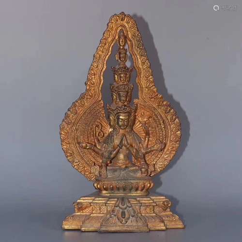 A BRONZE FIGURE OF EKADASHAMUKHA-LOKESHVARA