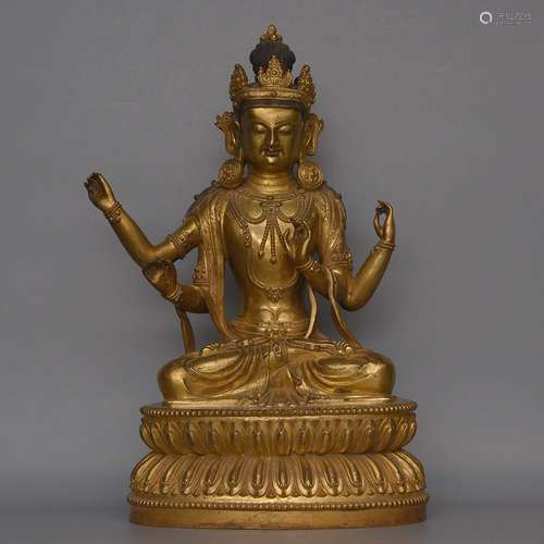 A GILT-BRONZE FIGURE OF MANJUSHRI