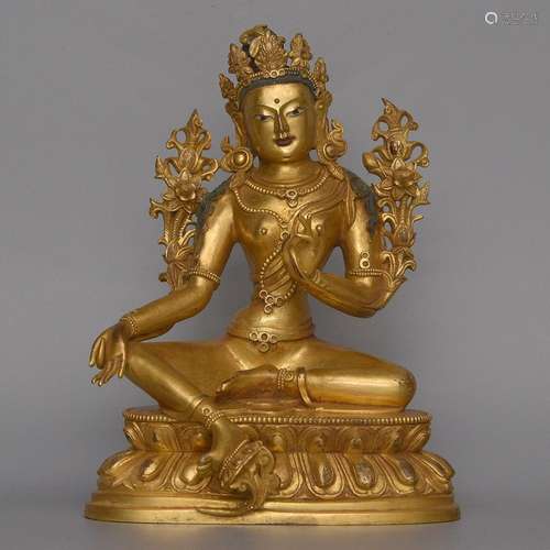 A GILT-BRONZE FIGURE OF TARA