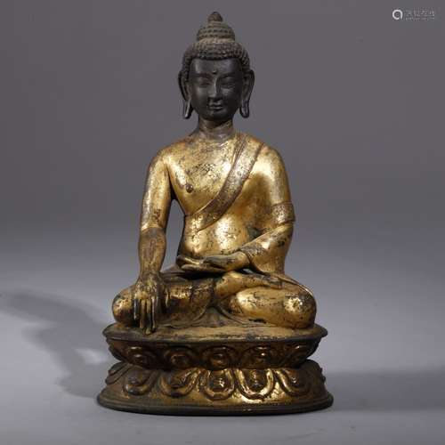 A GILT BRONZE FIGURE OF BUDDHA