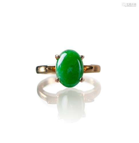 A DELICATE JADE AND GOLD RING