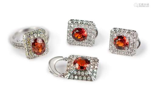 A SET OF FOUR GARNET AND DIAMOND ORNAMENT