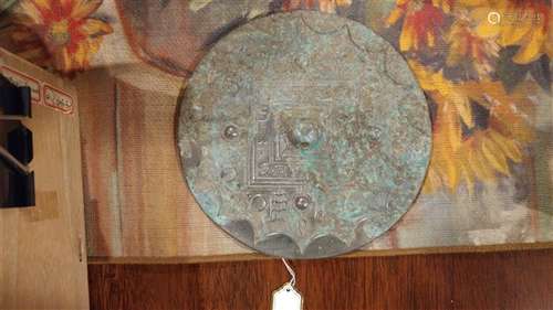 A HAN-STYLE CHINESE BRONZE MIRROR