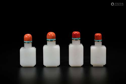 A set for four white jade snuff bottles. 19th Century