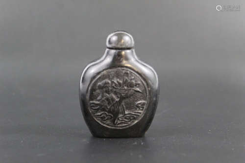 Chinese carved black stone snuff bottle