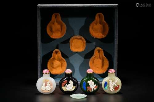 Set of four erotic scene jade snuff bottles and a