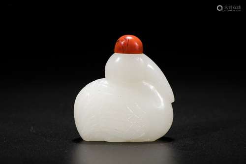 Chinese white jade bird snuff bottle. 19th Century.