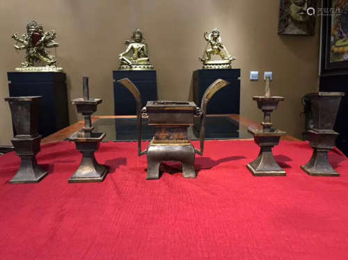 SET OF FIVE BUDDHIST TIN MOLDED UTENSILS