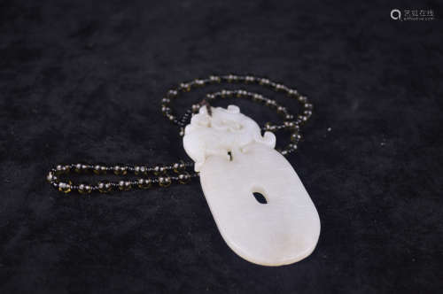 A JADE CARVED PENDANT