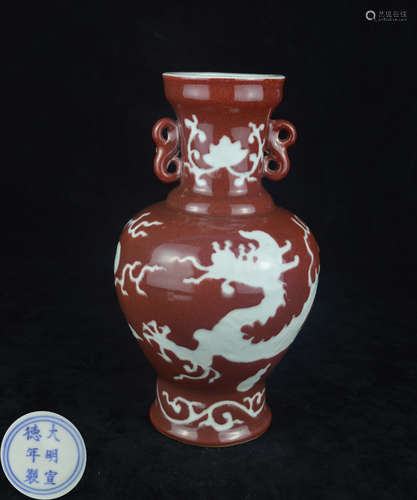 A JI RED GLAZE WHITE DRAGON PATTERN VASE