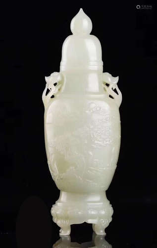 A HETIAN JADE MOUNTAIN PATTERN BOTTLE WITH COVER