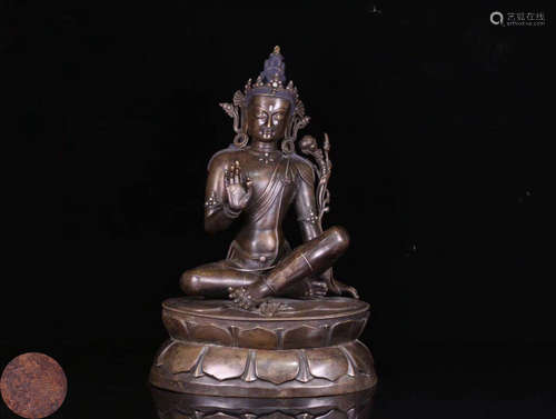 A BRONZE MOLDED BUDDHA STATUE