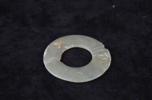 A JADE CARVED RING-SHAPED PENDANT