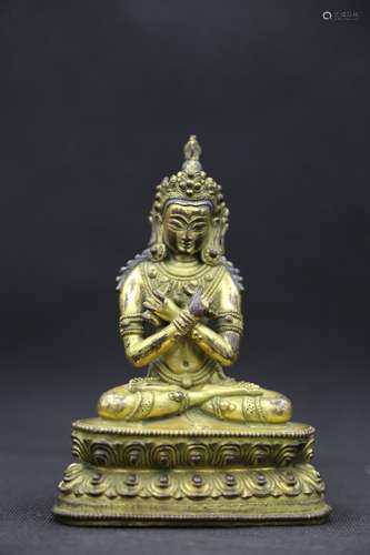 A GILT-BRONZE FIGURE OF MANJUSHRI