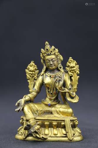 A GILT-BRONZE FIGURE OF TARA