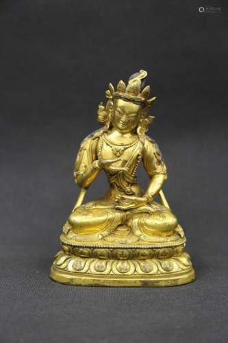 A GILT-BRONZE FIGURE OF MAITREYA