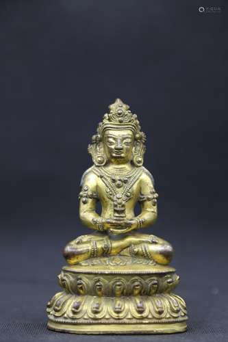 A GILT-BRONZE FIGURE OF MAITREYA