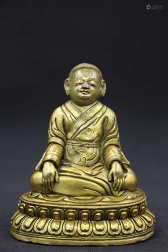 A GILT-BRONZE FIGURE OF BUDDHA