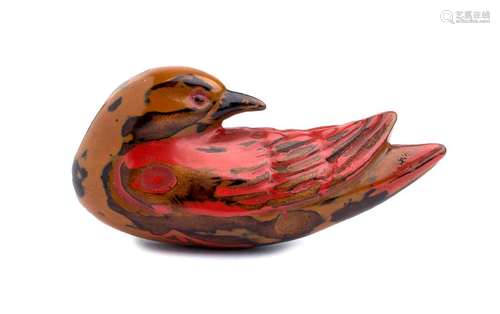 A LACQUERED WOOD NETSUKE OF A BIRD 19th century un...