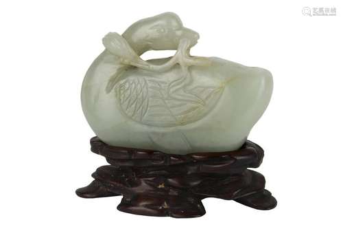 A PALE GREEN JADE CARVING OF LIU HAI China, Qing d...