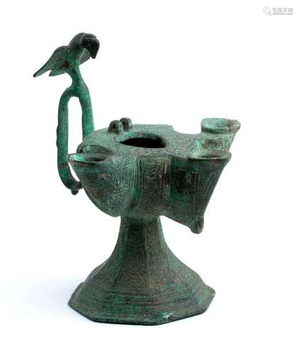 A TRIPLE WICKED INCISED BRONZE OIL LAMP Iran, Khor...