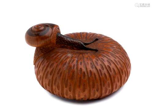 A WOOD NETSUKE OF A SNAIL ON A PUMPKIN mid 19th ce...