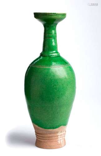 A GREEN GLAZED BOTTLE VASE China, Liao dynasty 36,...