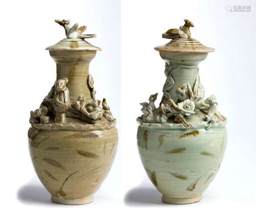 A PAIR OF QINGBAI GLAZED URNS AND COVER WITH APPLI...