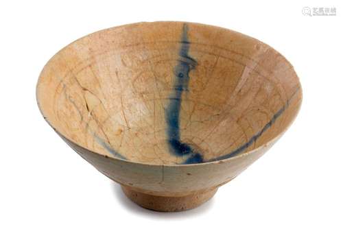 A CREAM GLAZED BLUE STRIATED INCISED BOWL Iran, 12...