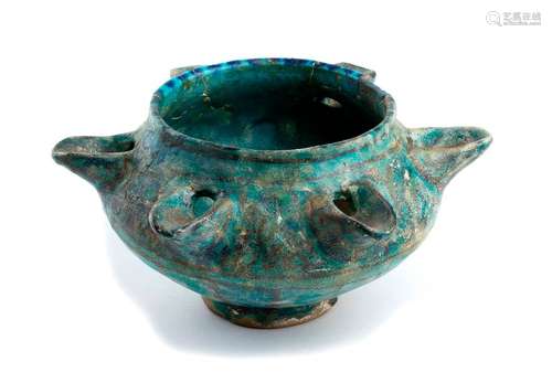 A TURQUOISE GLAZED MOULDED ‘CALLIGRAPHIC’ SIX WICK...