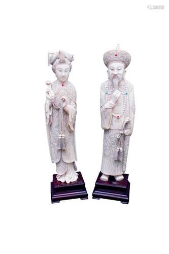 TWO HARDSTONE INLAY IVORY CARVINGS OF THE STANDING...