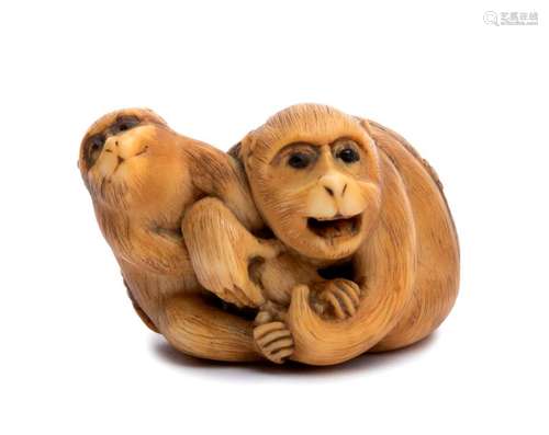 A HORN INLAID IVORY NETSUKE OF A MONKEY AND CUB Ky...