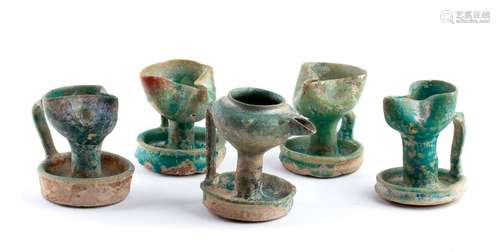 FIVE TURQUOISE GLAZED HANDLED OIL LAMPS Iran, Nish...