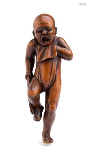 A WOOD NETSUKE OF MAN WEARING THE FUNDOSHI 19th ce...