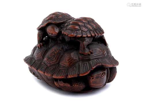 A WOOD NETSUKE OF A TURTLE AND TWO CUBS second hal...