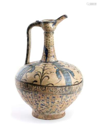 A GLAZED BLUE AND WHITE PAINTED EWER Iran, Kashan,...