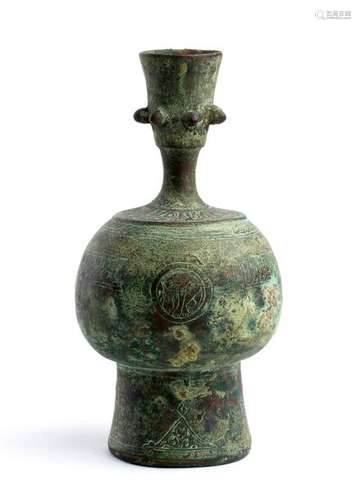 A BRONZE INCISED BOTTLE Iran, 10th century 18 cm h...