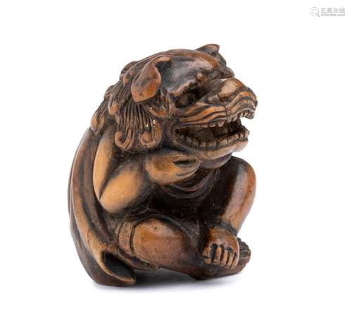 A WOOD NETSUKE OF SHISHIMAI Hida Takayama, mid 19t...