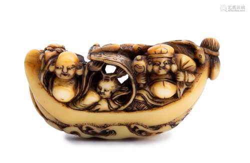 A MARINE IVORY NETSUKE OF TAKARABUNE WITH THE SHIC...