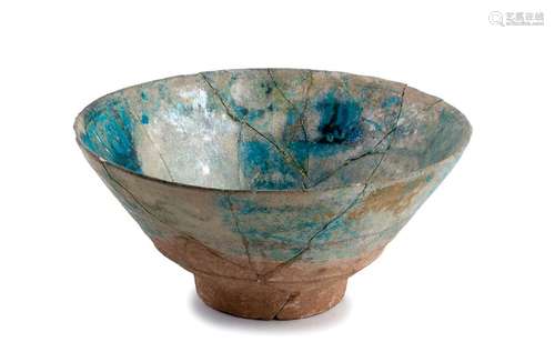 A TURQUOISE GLAZED PAINTED BOWL Iran, 12th–13th ce...