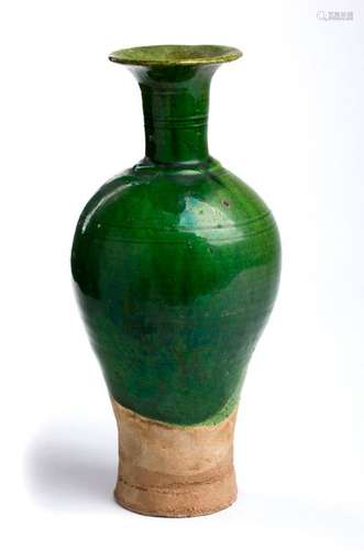 A GREEN GLAZED BOTTLE VASE China, Liao dynasty 28,...