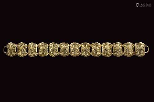 AN ACEH STYLE GILT SILVER BELT AND BUCKLE Indonesi...